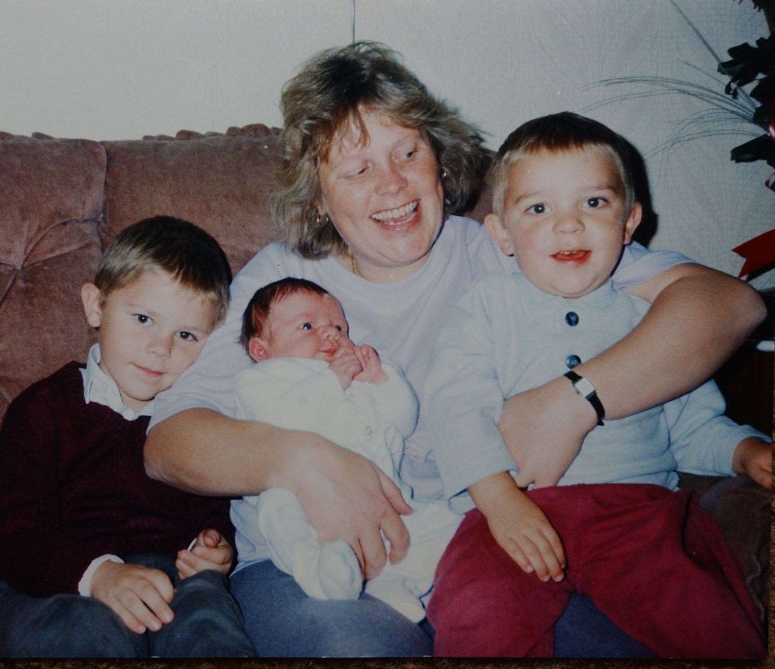 Debbie Griggs with her three sons, Jeremy, Jake and baby Luke