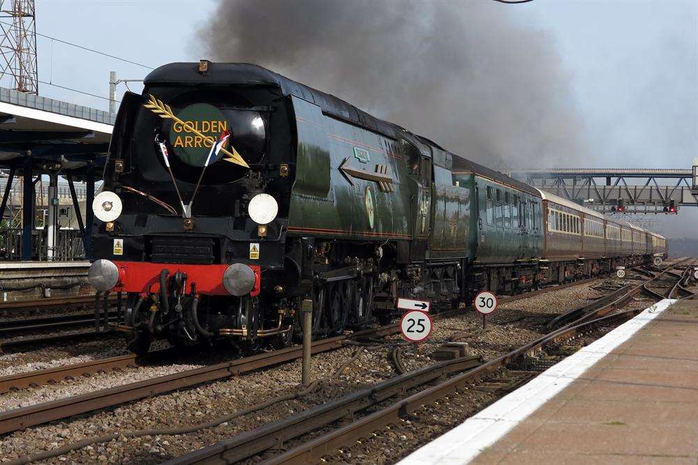 The Golden Arrow passes through Ashford in this atmospheric picture taken by Andy Clark