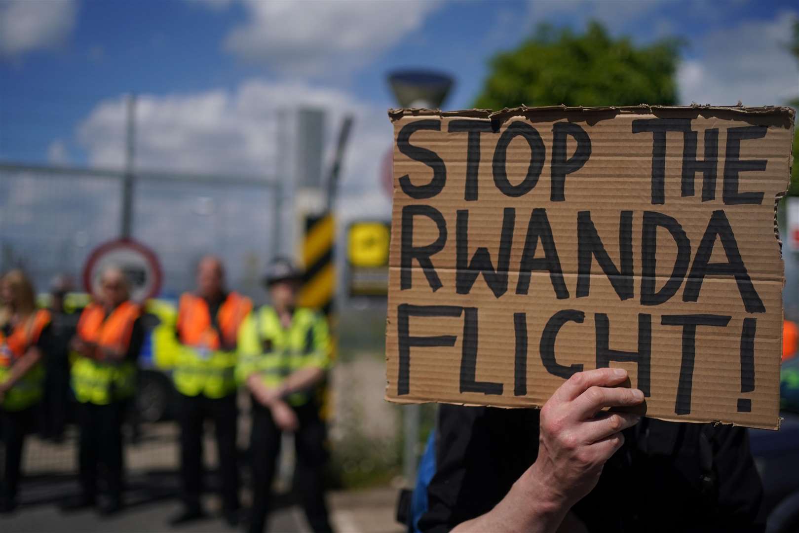 Protesters campaigning against plans to send migrants to Rwanda (Victoria Jones/PA)