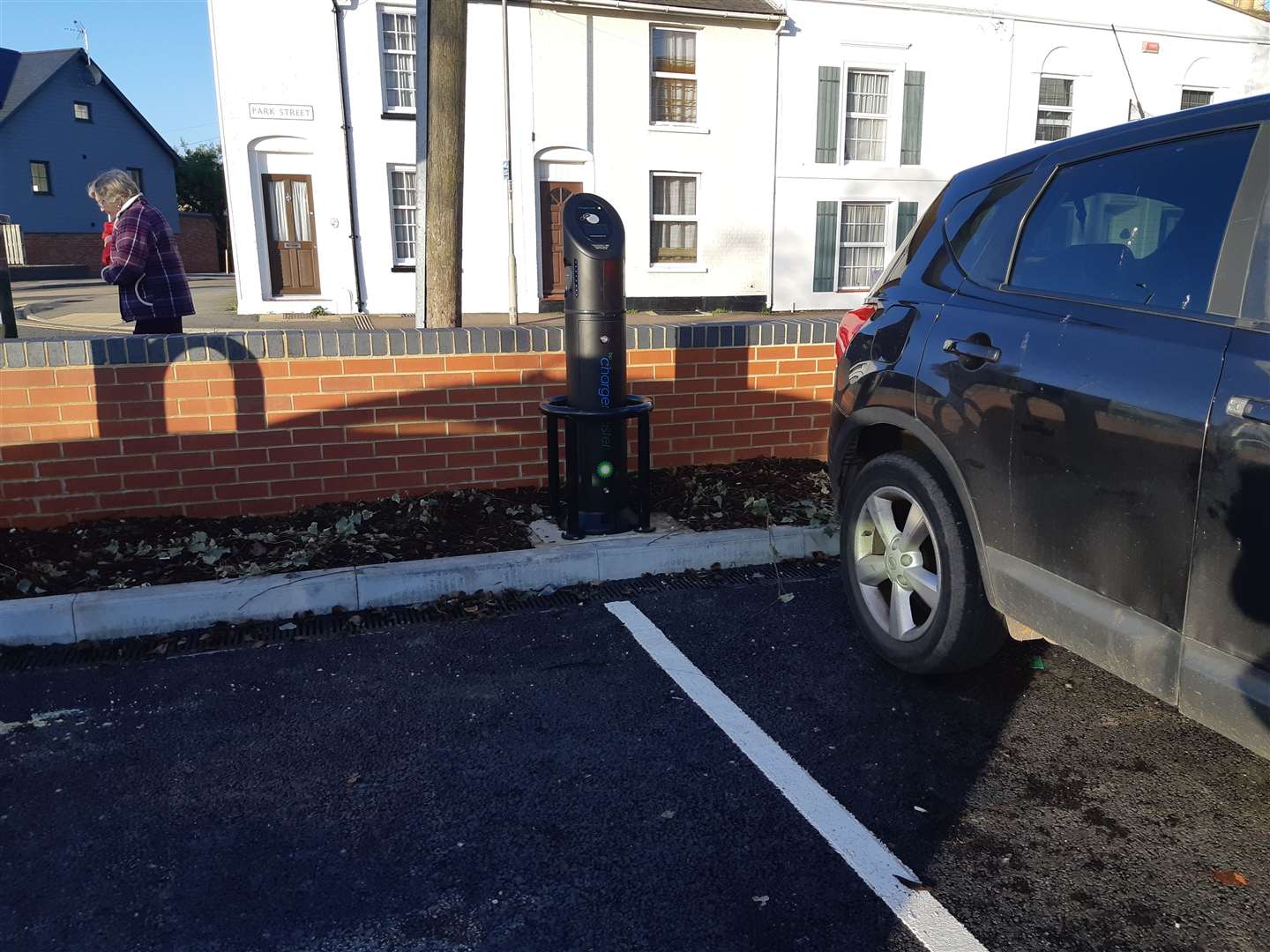 The one electric car charging point serves two bays