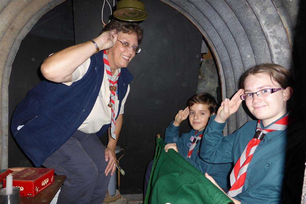 Finn Longley and Victoria Bell were invested by 1st Teynham Scout leader Amanda Seymour inside an Anderson air raid shelter