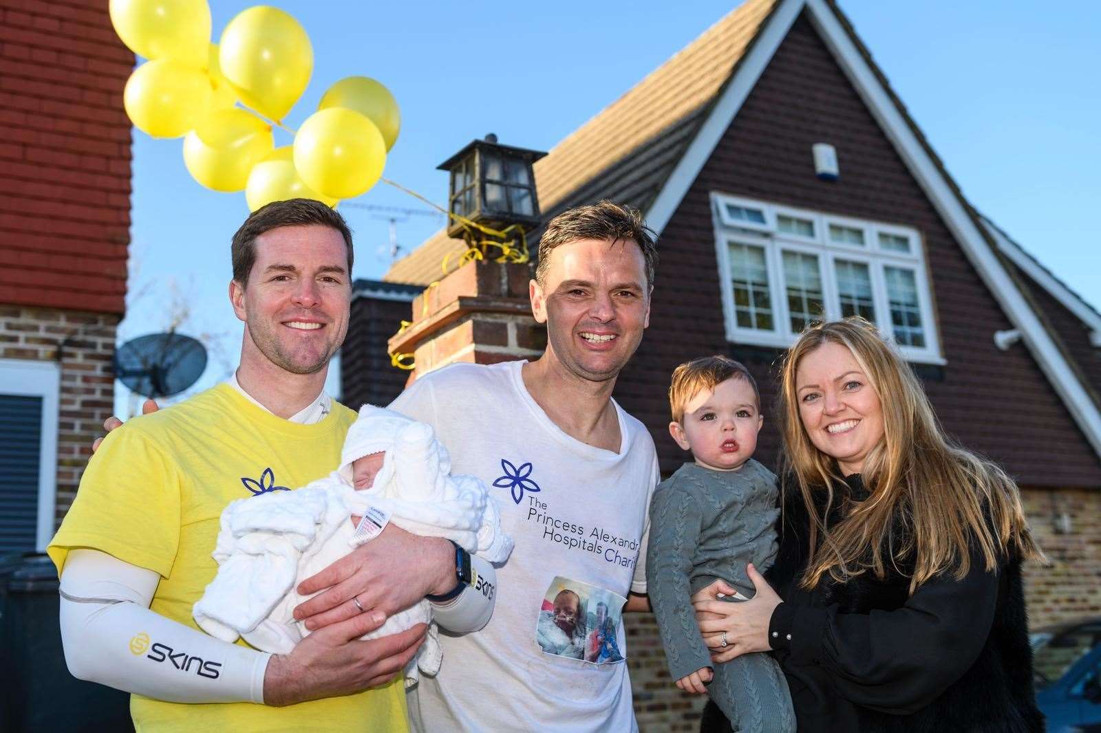 Marc Petters, centre, with friends Neil and Laura Rowe and their sons Ralph, 2, and six-week-old Samuel. Picture: Marc Petters