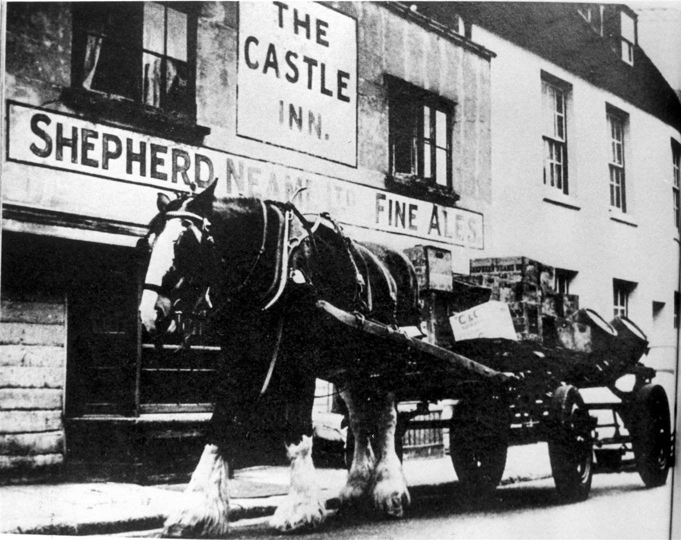 Shepherd Neame continued to use horses for deliveries for many years as well as using motor transport. The horse era ended at the brewery in 1968. Charlie, the last of the dray horses, appears in this picture taken in 1963 outside the Caslte Inn in West Street, Faversham