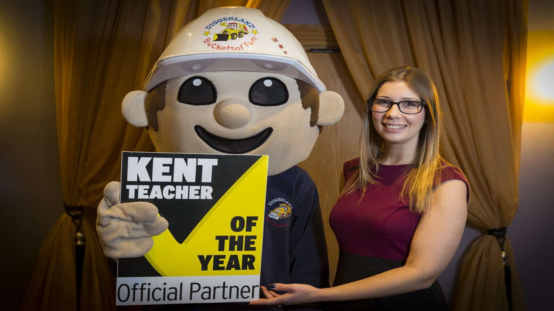 Sherene Garvin-Mack (with mascot Duggy) of Diggerland which is supporting the Kent Teacher of the Year Awards 2018.