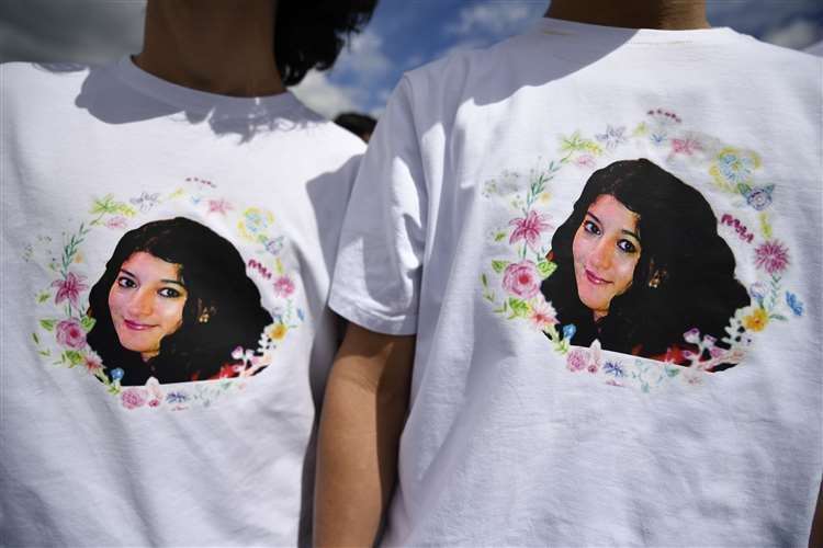 People wore T-shirts bearing Zara's face. Picture: Beresford Hodge/PA