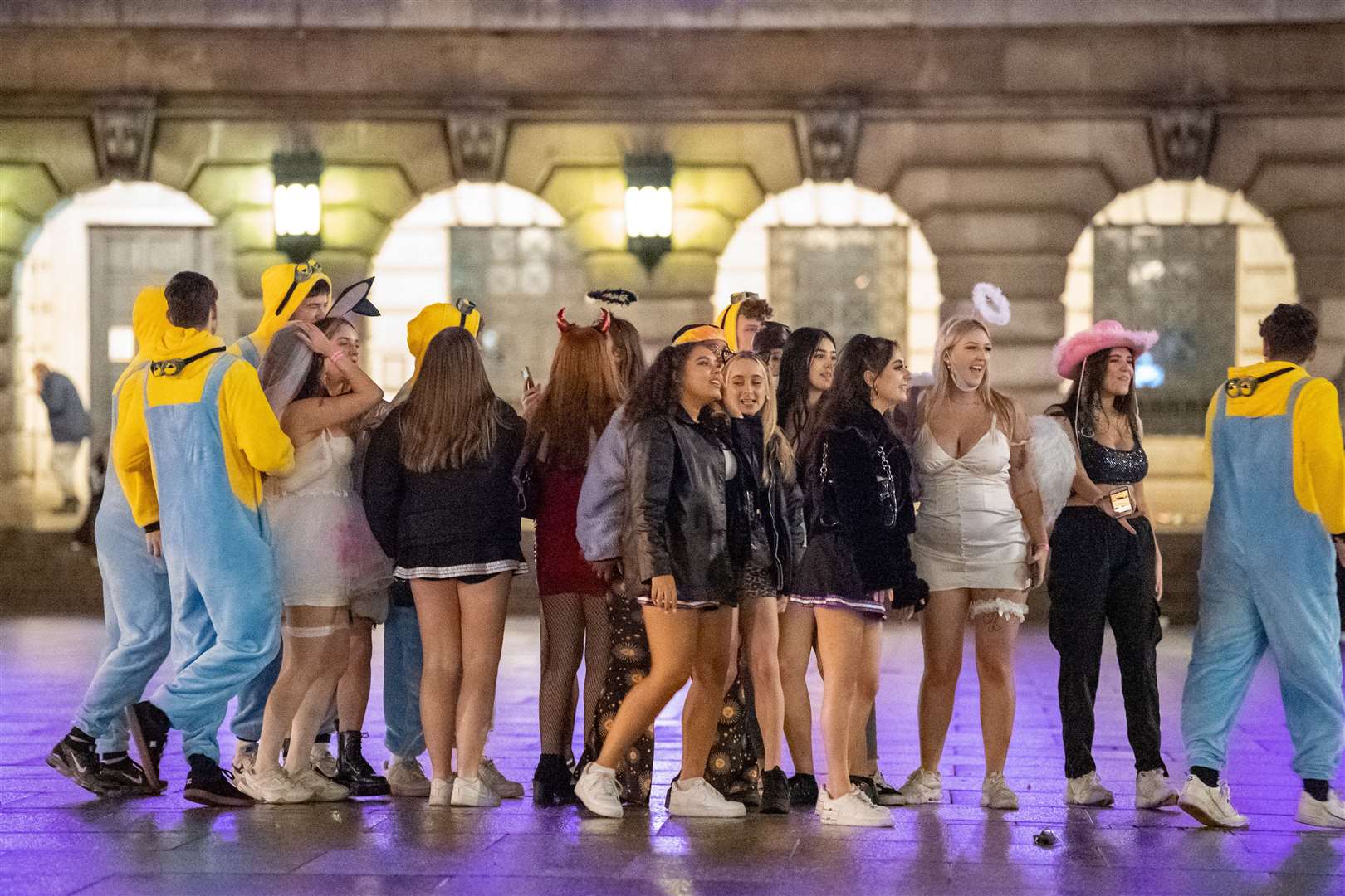 People in fancy dress in Nottingham after pubs and bars closed, with the city set to move into Tier 3 (Joe Giddens/PA)