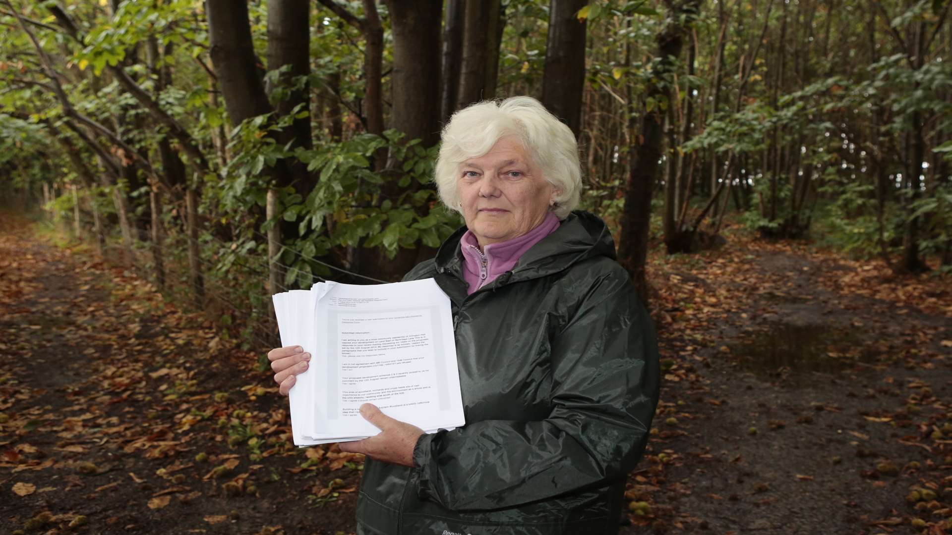 New Allington Action Group chair Barbara Woodward with a 300-signature petition against two new applications to build on homes near Bluebell Wood.