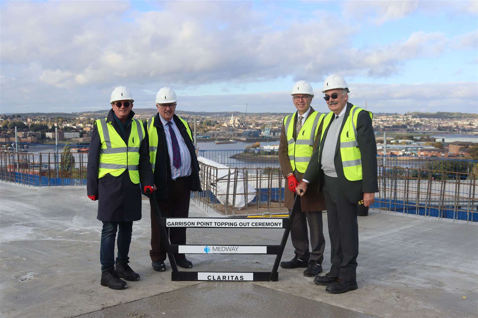 From left: Peter Sloane, Cllr Howard Doe, Jonathan Sadler and Cllr Adrian Gulvin from MDC at the Garrison Point topping out ceremony. Picture: Medway Council