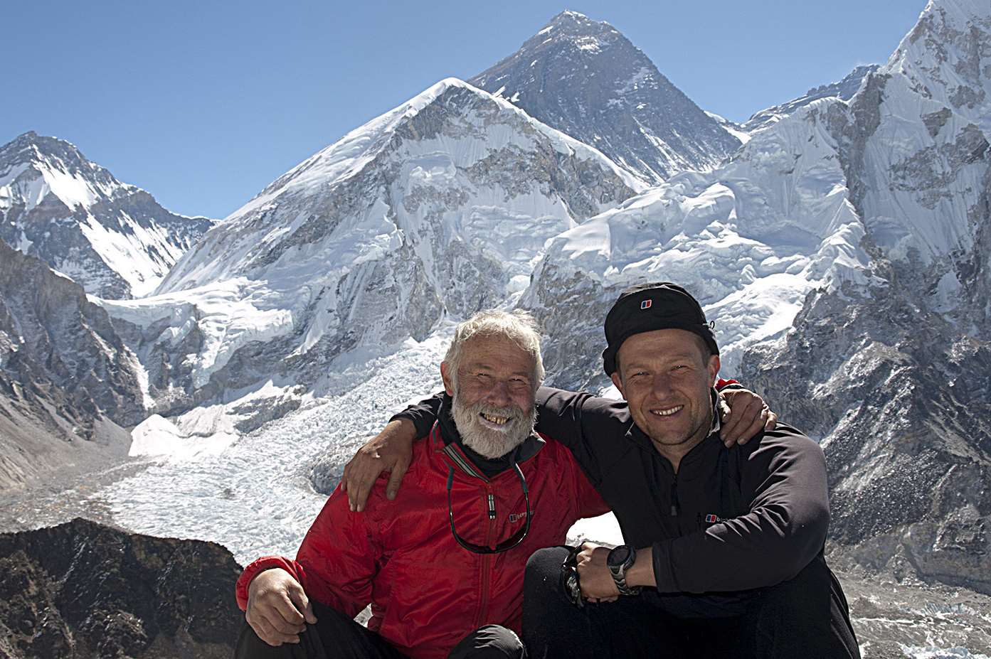 Sir Chris Bonington and son Joe Bonington with Everest in the background