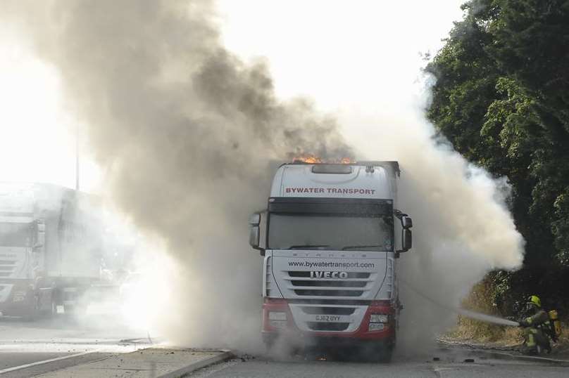 Plumes of smoke billowed into the sky from the blazing lorry. Picture: Ruth Cuerden