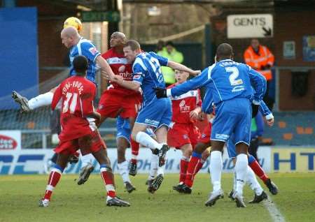 Oldham's players clear the danger following a Gillingham corner. Picture: BARRY GOODWIN