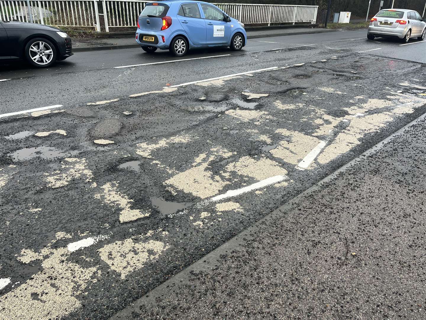 What the road looked like before repairs were made today