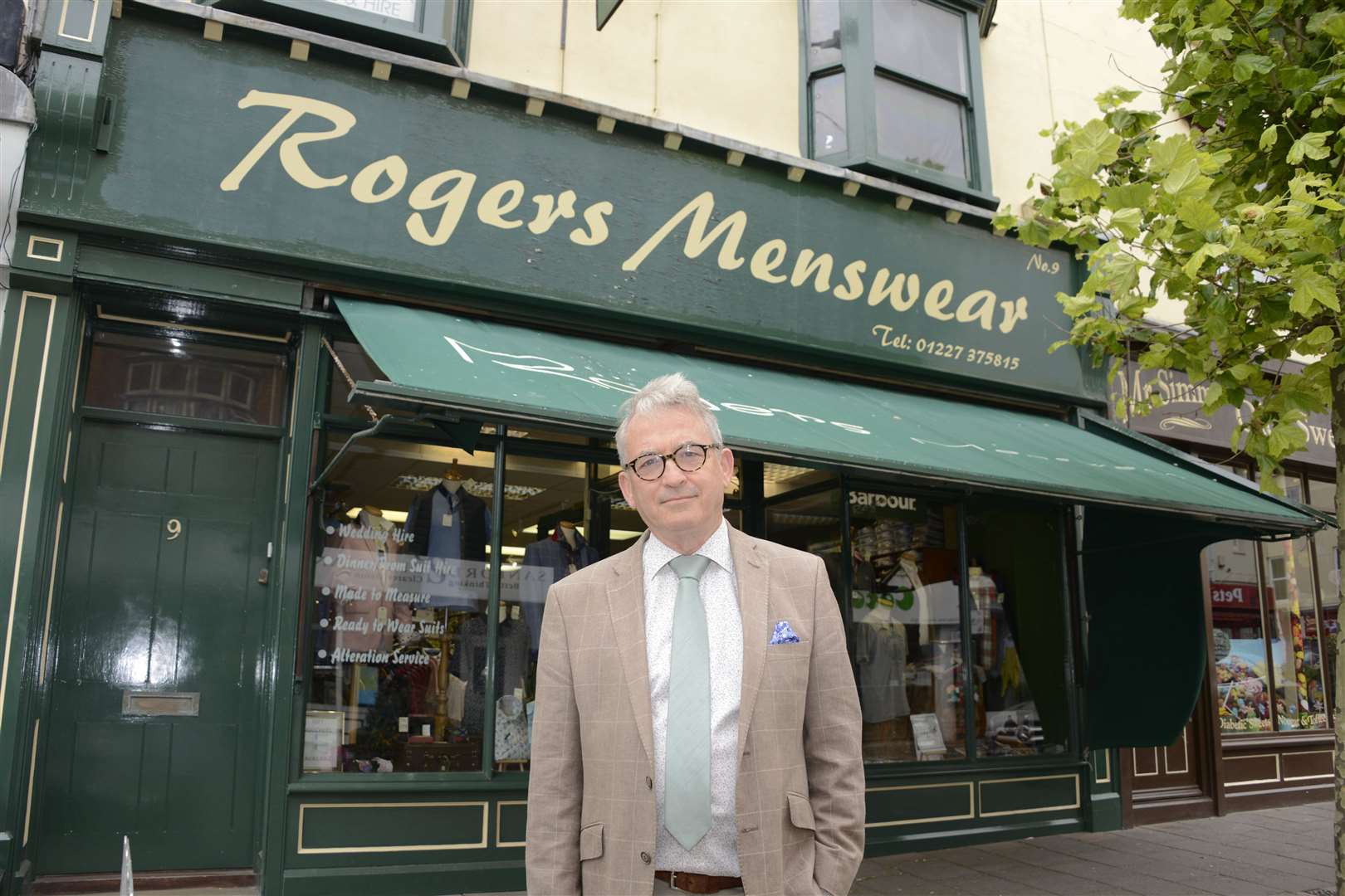 Roger's Menswear owner Tony Symons says barring someone who came in without a mask would “create a confrontation”