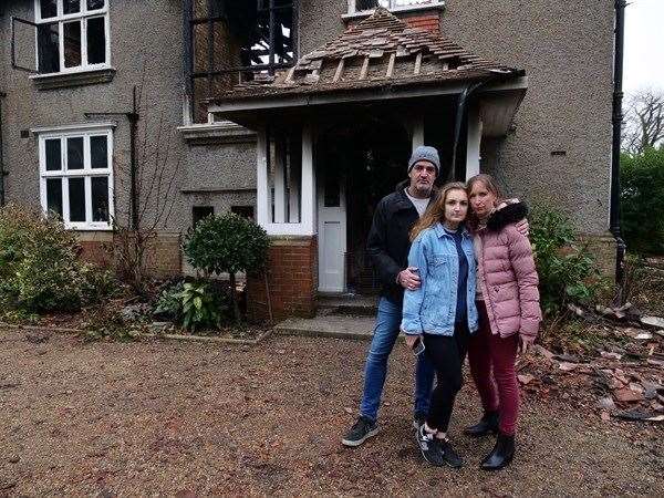 David, Bronte and Claire Sercombe outside their house. Picture: KFRS