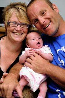 Mum Lindsey Checksfield, baby Layla-Jade and proud dad Alan Howard
