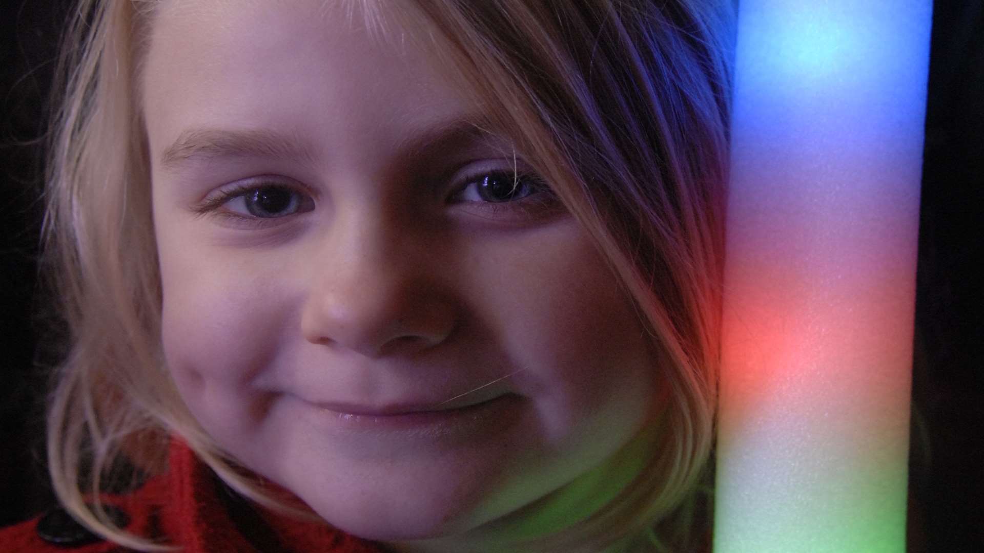 Sadie Belsey, six, with her light stick in St George's Street
