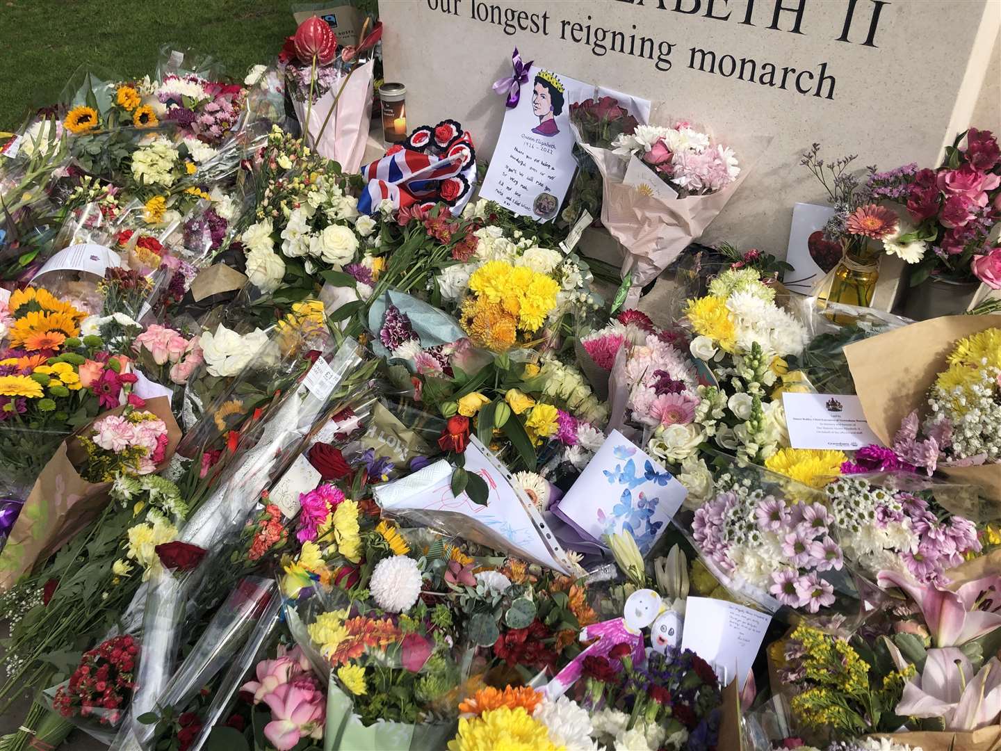 The floral tributes are growing daily