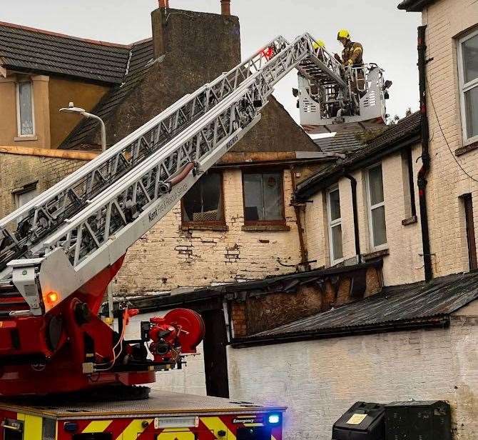 Firefighters responding to roof damage in Linden Crescent, Folkestone. Picture: Peter Phillips