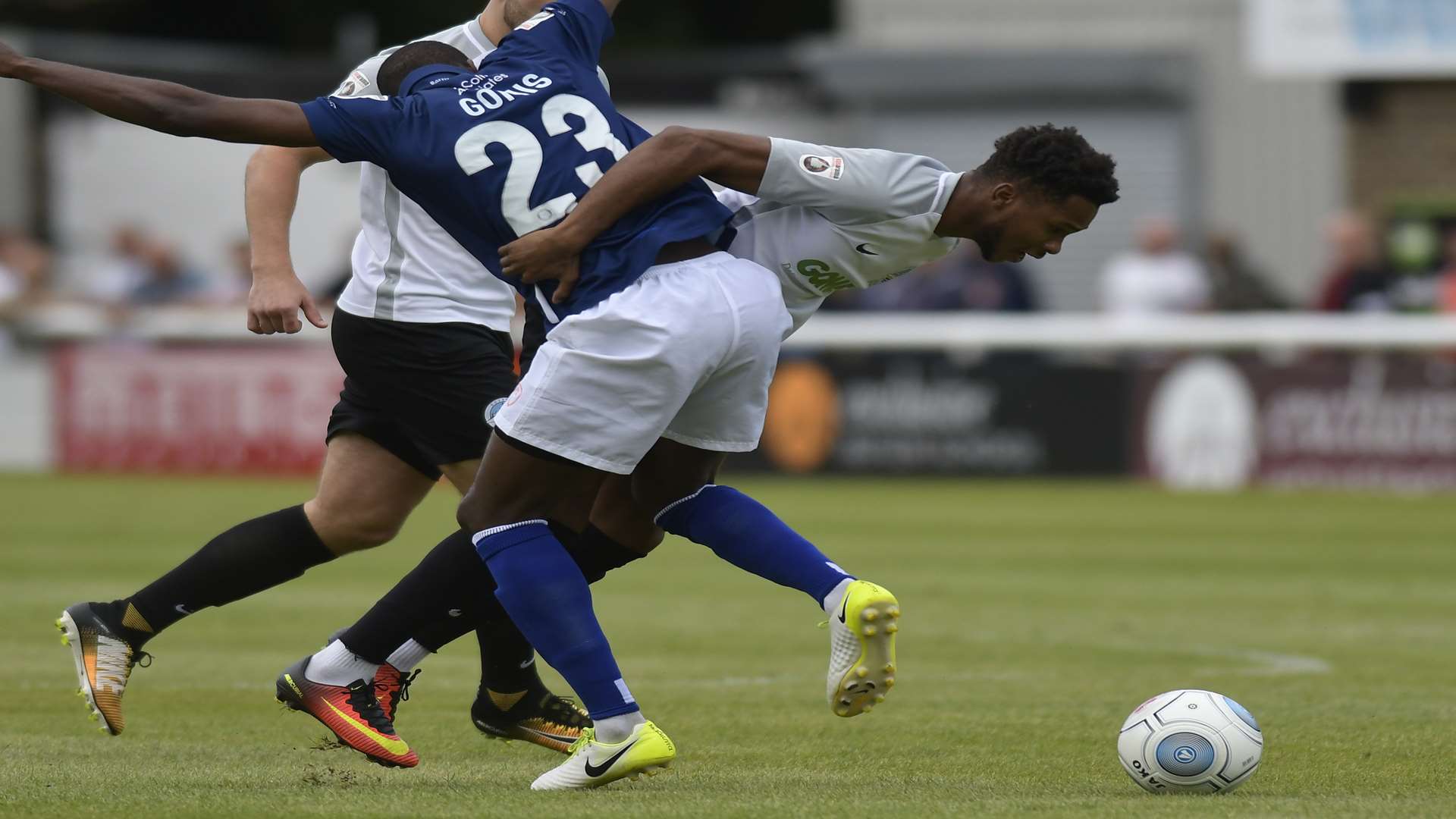 Kane Richards battles for the ball with Barrow's Bedsente Gomis Picture Tony Flashman