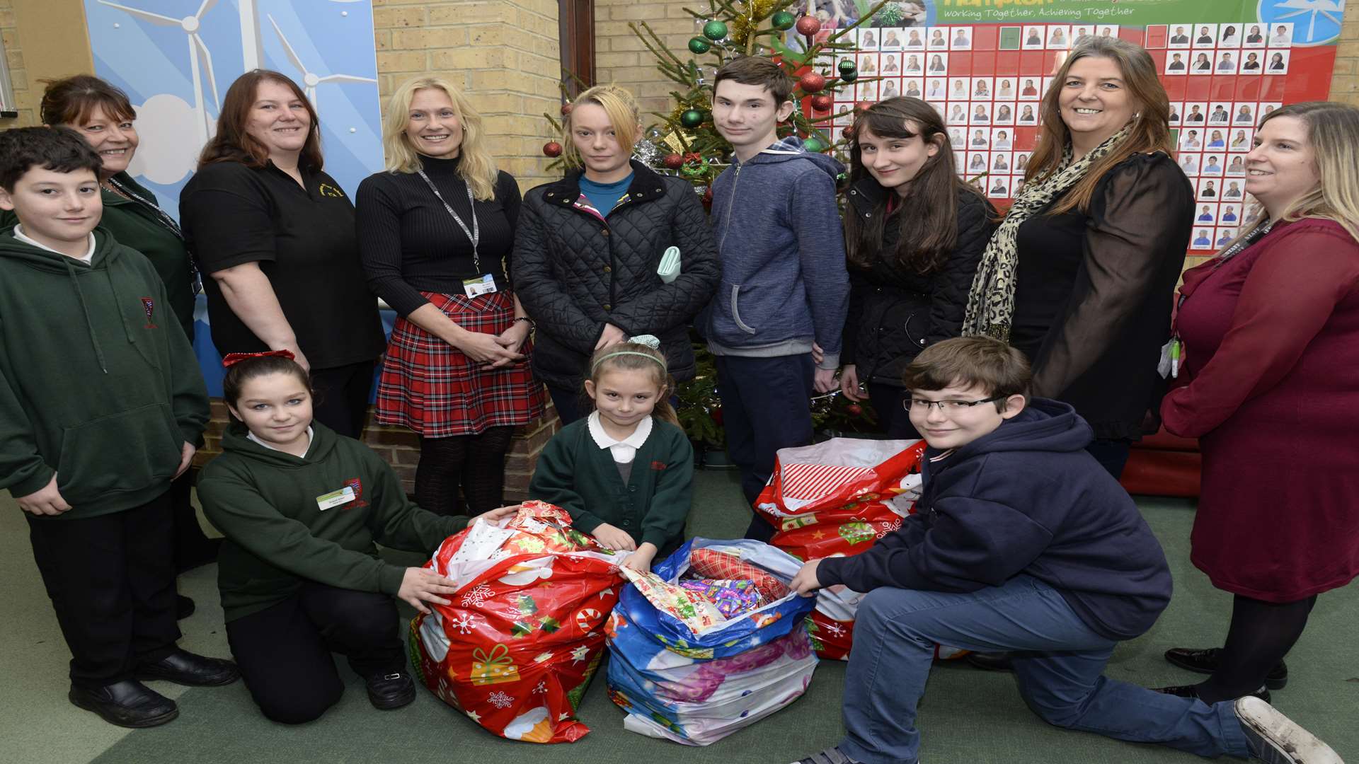 Pupils and staff from Hampton Primary School and Trinity School and College in Rochester at the handover of clothes and gifts. Picture: Chris Davey