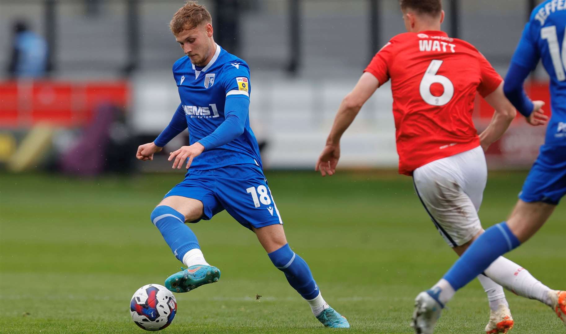 Ethan Coleman on the ball for Gillingham as they take on Salford in League 2