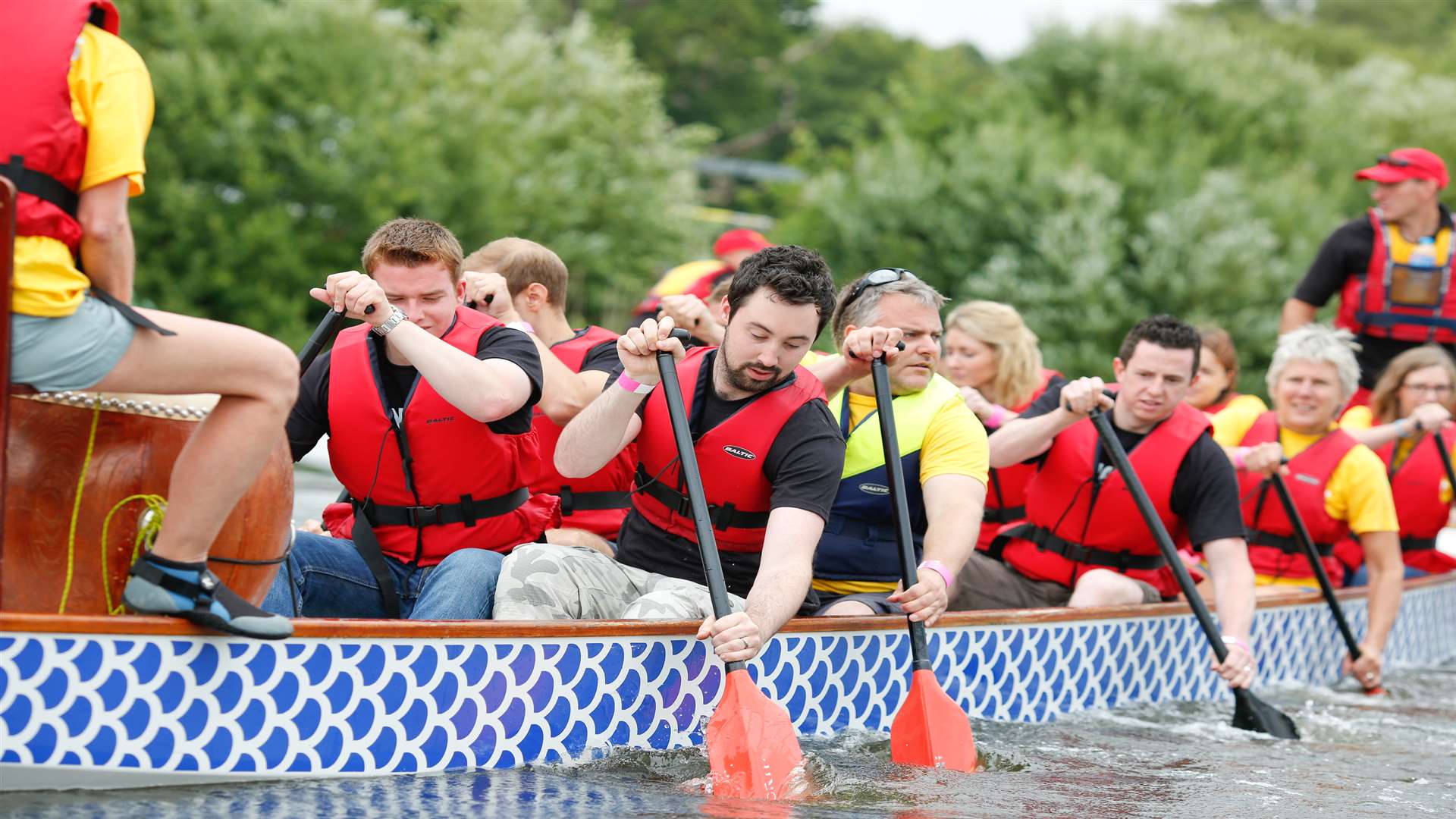 Experience the Difference team from Maidstone take to the water for last year's KM Dragon Boat Race at Mote Park, Maidstone.