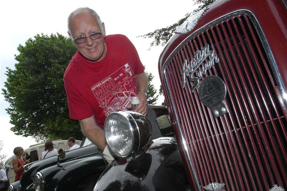 Ray Neale polishes his 1938 Austin Seven Ruby.