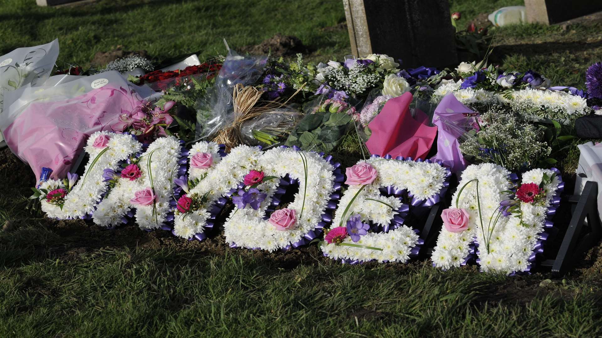 Flowers placed at the grave of Jayden Parkinson at St Martin's Church in Cheriton
