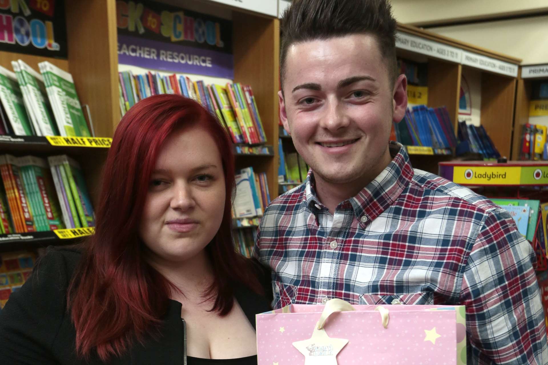 Paige Tomlinson and Craig Capp with their gifts for Katie Price's children