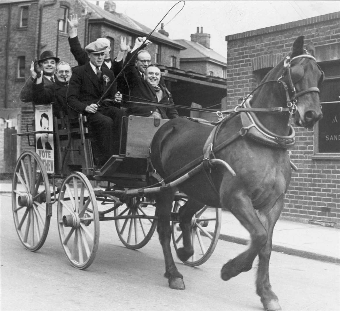 Off to the polls in February 1950 during petrol rationing. The Conservatives were returned to power, but not in the constituency where these electors voted. Mr A G Bottomley (Labour) retained his seat for Chatham and Rochester