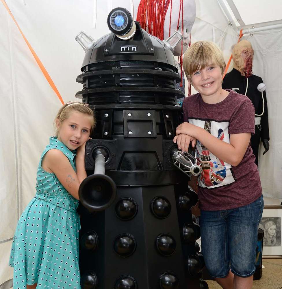 Evie Last aged eight and Harrison Last, ten, with a Dalek at the Dr Who themed event at Westwood Cross retail park.