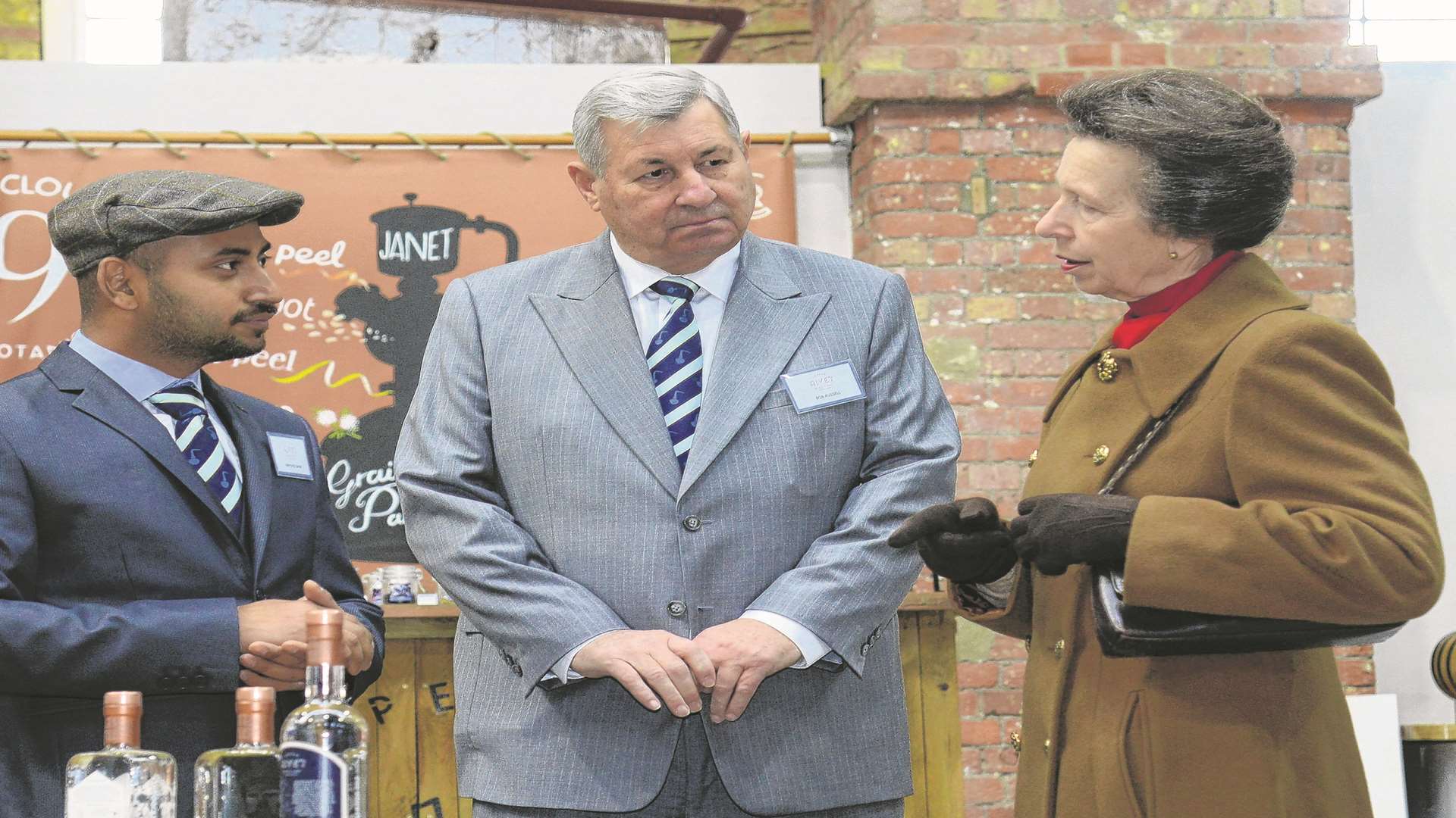 Abhi Naik, head distiller, and Bob Russell, co-founder, with Princess Anne Credit: Gary Browne