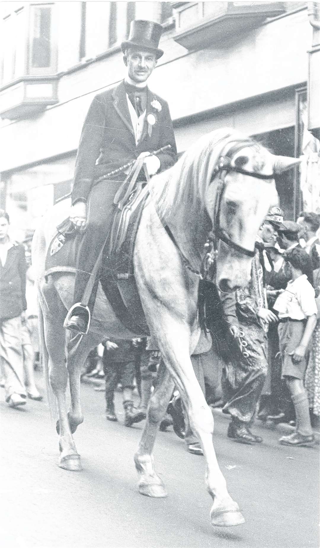Sir Garrard Tyrwhitt-Drake riding through Maidstone High Street in 1933