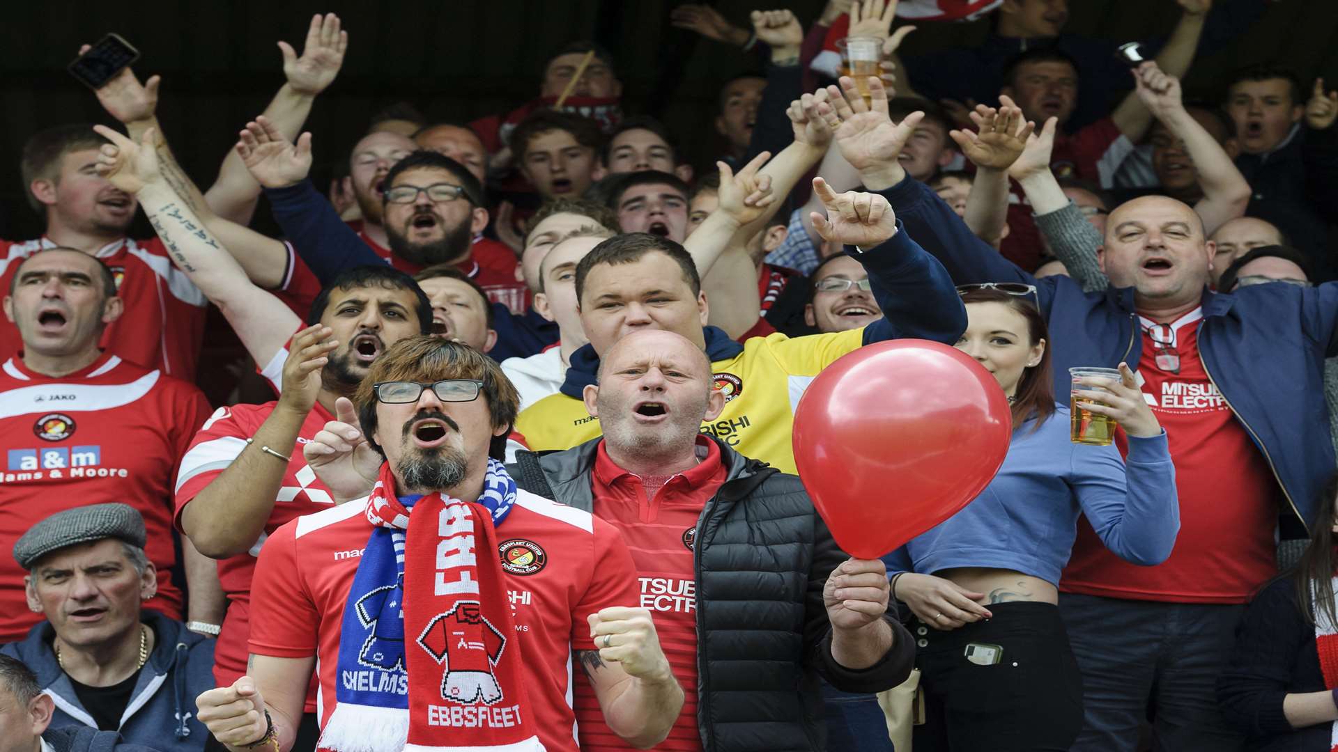 Fleet fans get behind their side in the play-off final Picture: Andy Payton