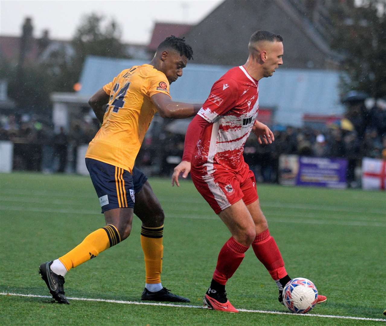 Leading scorer Joe Taylor in possession against Woking. Picture: Barry Goodwin
