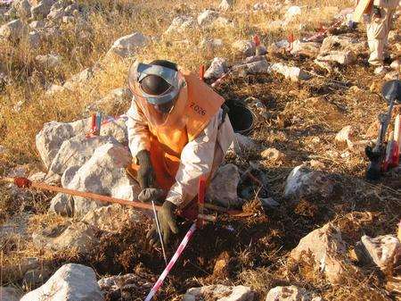 A BACTEC mine clearance expert at work