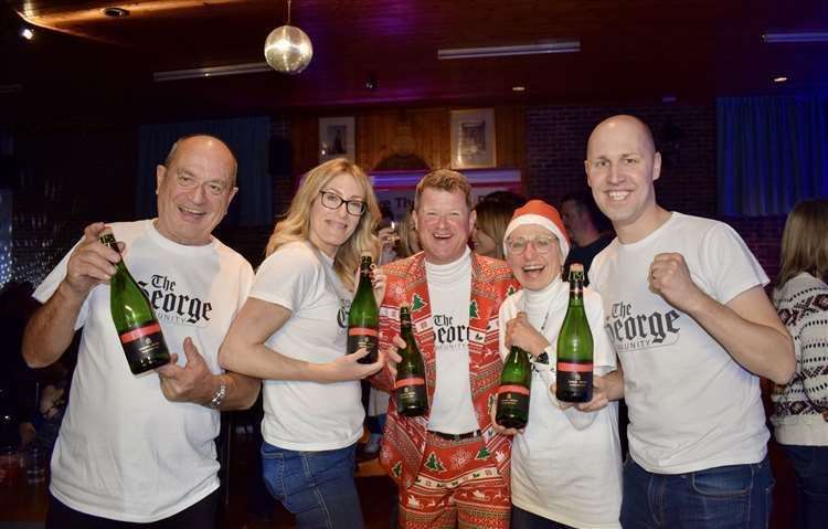The George Community head committee celebrates successfully raising the funds to buy the pub
