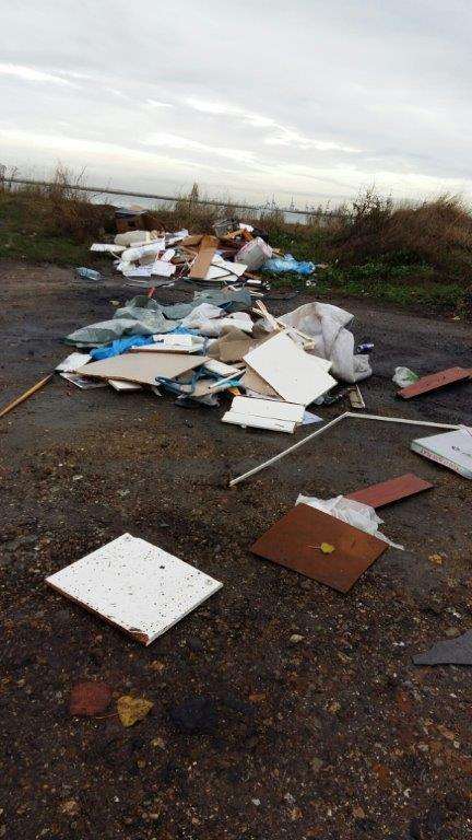 Building and demolition waste including wood, shelves and carpets was found dumped on Raspberry Hill Lane