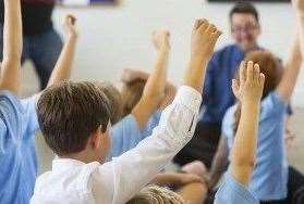 Children in a classroom. Stock image.