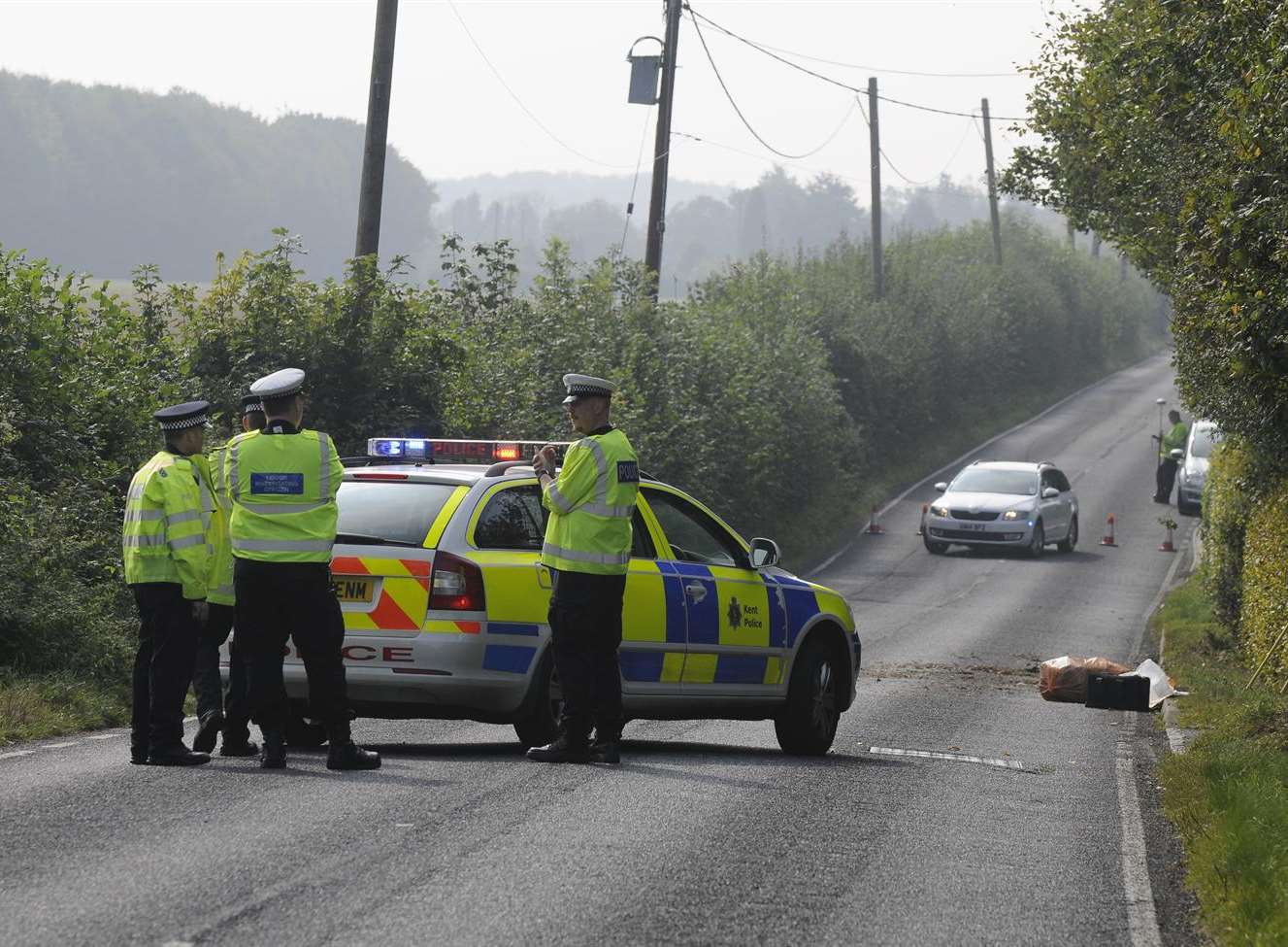 Police at the scene of the crash in Stone Street, Petham