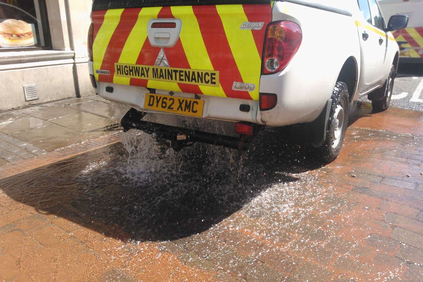 A truck drove over the spout to stop water flying all over the town centre