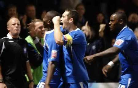 Chris Dickson celebrates with team-mates after putting the Gills ahead
