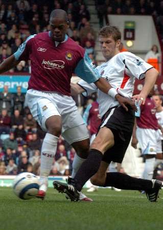 Hermann Hreidarsson clears the ball from Marlon Harewood. Picture by MATTHEW WALKER