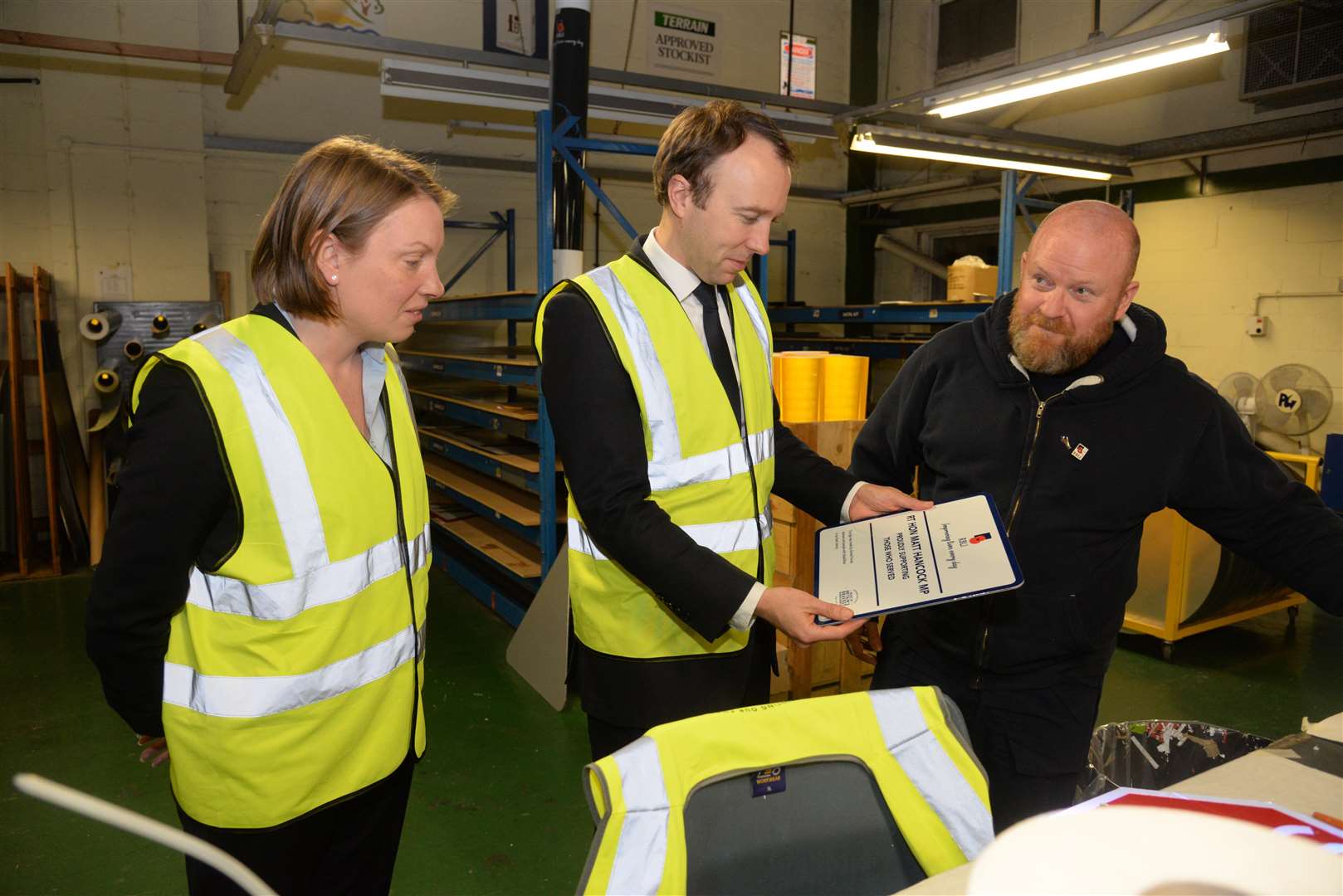 Tracey Crouch MP and Health and Social Care Secretary Matt Hancock meet former serviceman Tim Brown at the Royal British Legion Industries headquarters. Picture: Chris Davey
