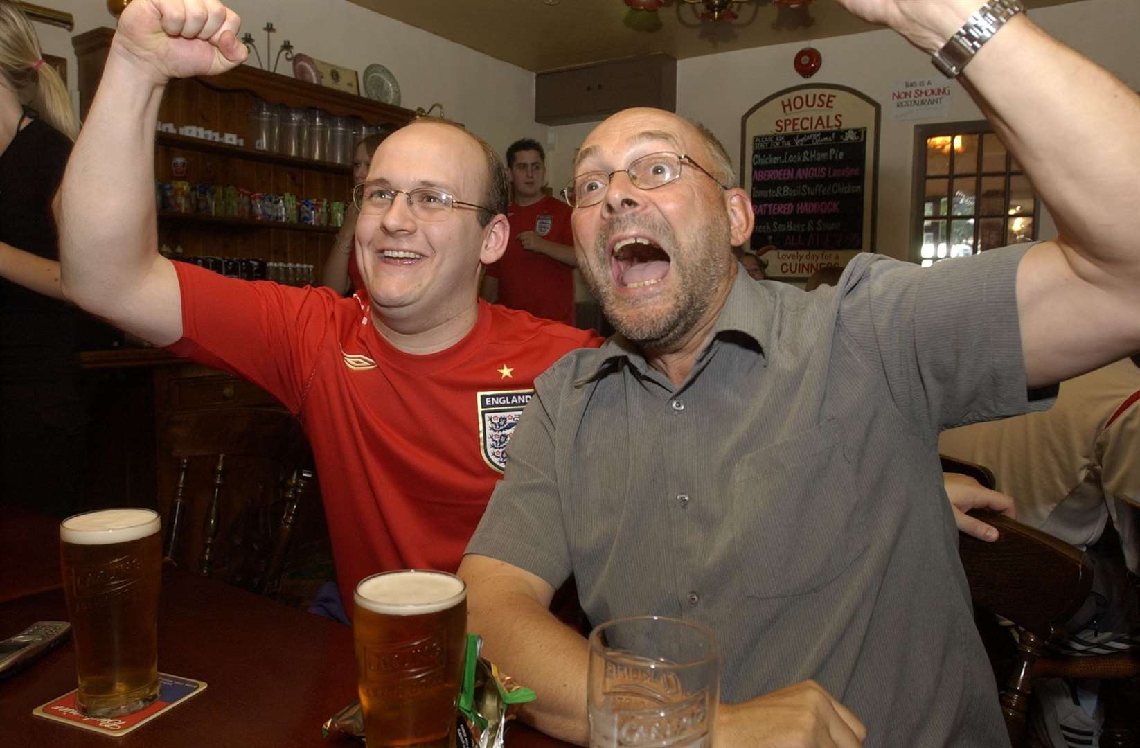Cheer as Portugal miss one of their penalties and England score...