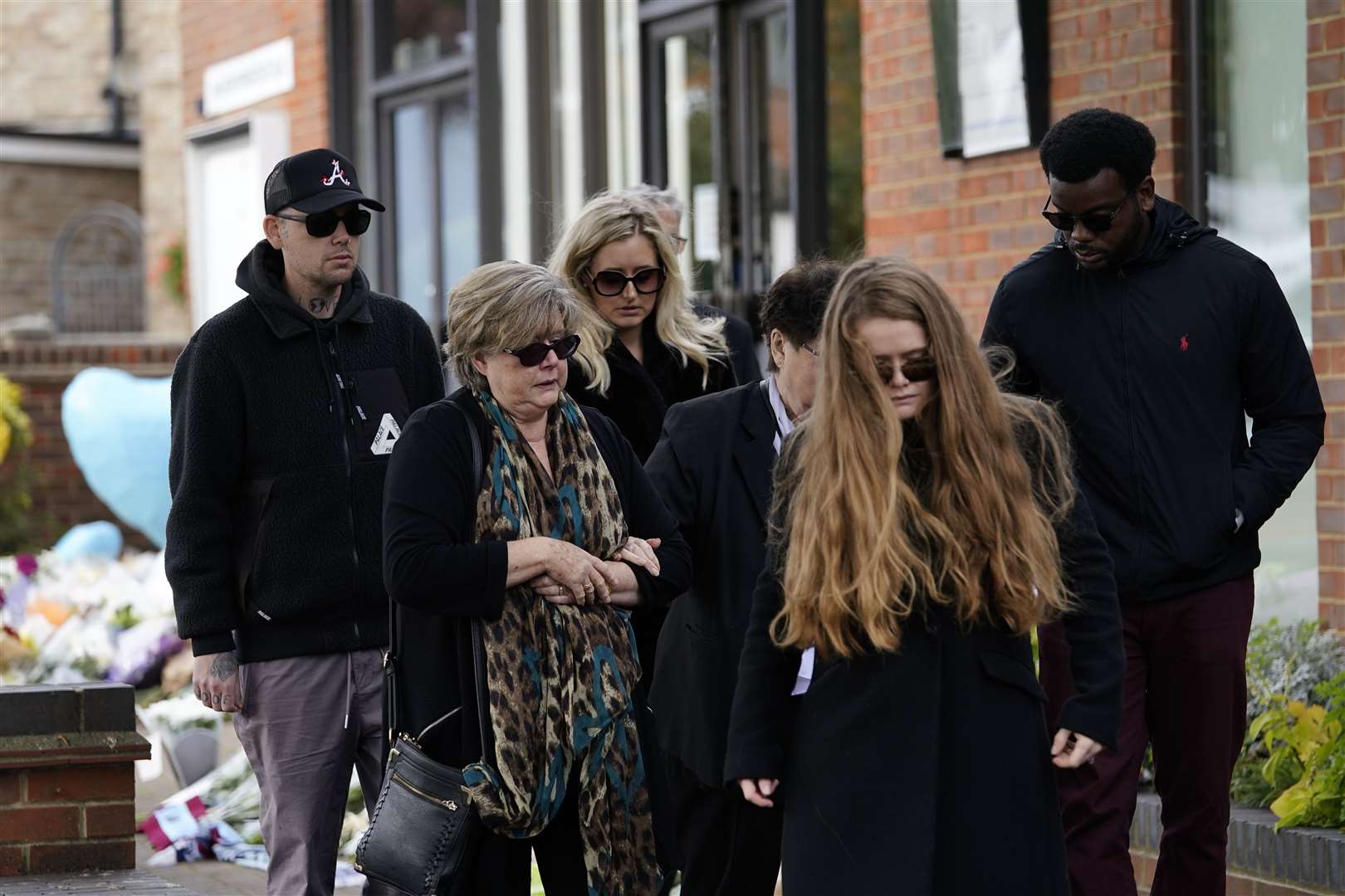 Julia Amess (second left), the widow of Conservative MP Sir David Amess, arrives with friends and family members (Aaron Chown/PA)