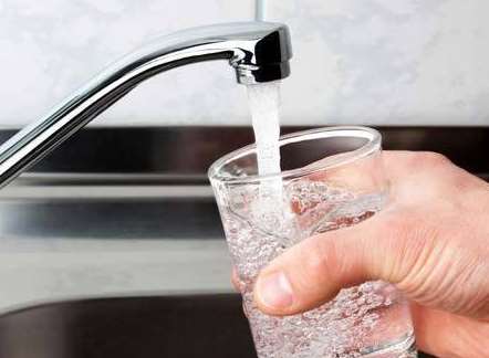 Households may find water is discoloured or notice a drop in pressure. Stock Image