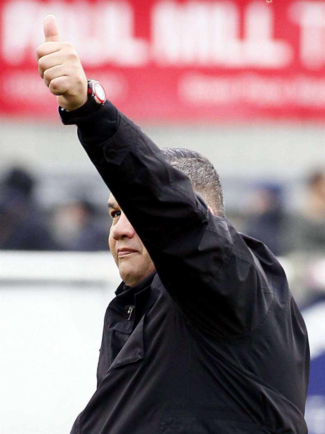 Thumbs up from Maidstone head coach Hakan Hayrettin at full-time Picture: Sean Aidan