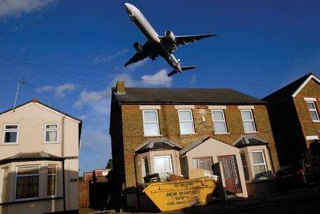 Plane flies over house in Faggs Road, Feltham. Picture courtesy Trinity Mirror Southern Ltd