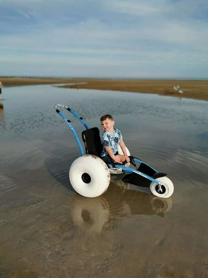 Tony Hudgell on his all-terrain wheelchair at Camber Sands (12339662)